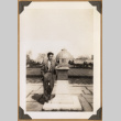 Gary Kikawa poses with a plaque (ddr-densho-542-71)