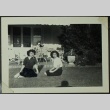 Women and baby on a lawn (ddr-densho-201-401)
