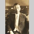 Man seated in a chair (ddr-njpa-4-2450)