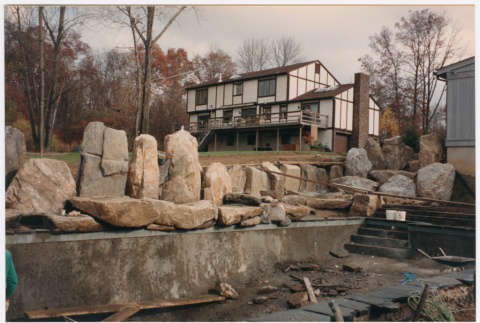 Pool with rock feature under construction (ddr-densho-377-2399)