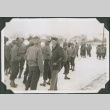 Group of men standing in snow (ddr-ajah-2-450)