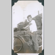 Photo of Paul Ima with a bicycle (ddr-densho-483-1234)
