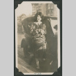 woman next to car (ddr-densho-378-541)