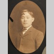 Portrait of Nikkei man in a suit (ddr-densho-259-438)