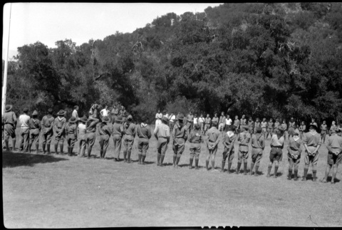 Boy Scouts stand in a circle (ddr-densho-480-39)