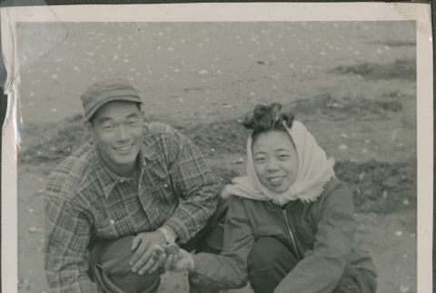 Matsuo and Jean Masae Sakagami digging clams (ddr-densho-201-894)