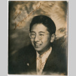 Photo of man with inscription (ddr-densho-426-1474)