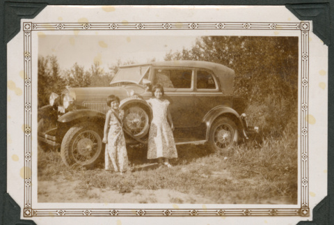 Photo of Ritsuko and Michiko with a car (ddr-densho-483-249)