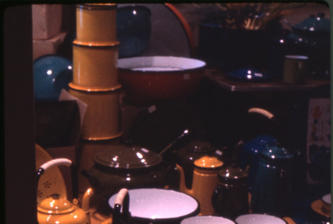 Display of enamelware bowls and coffee pots, lacquerware ashtrays (ddr-densho-426-334)