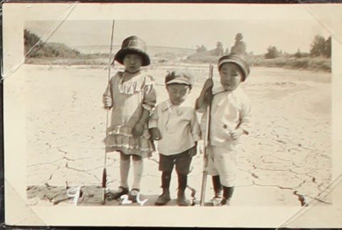 Nisei children on a stagnant slough (ddr-densho-259-427)