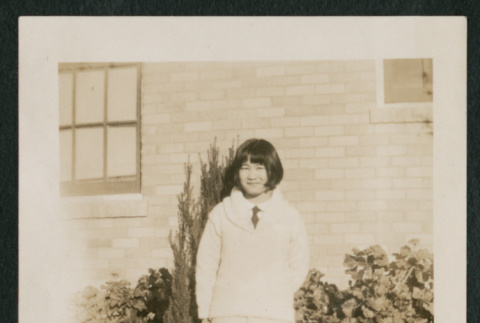 girl next to bush (ddr-densho-378-418)