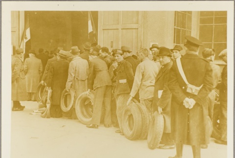 Men donating rubber tires to the war effort (ddr-njpa-13-707)