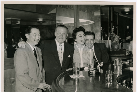 Mary Mon Toy and Jose Villa Nueva with two unidentified men at a bar (ddr-densho-367-154)