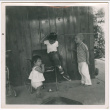Three children on a patio (ddr-densho-433-595)