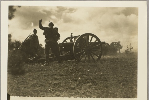 Photos of Polish soldiers training with a cannon, and walking behind a plow (ddr-njpa-13-1081)