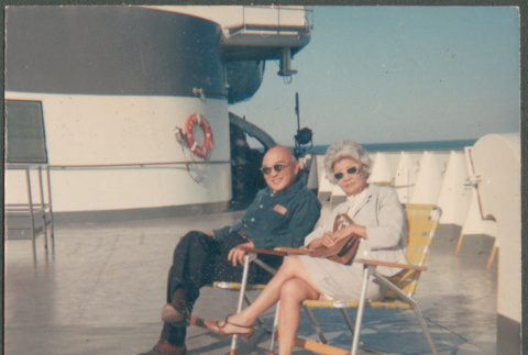 Agnes and Chester Sakura on deck of ship crossing Lake Michigan (ddr-densho-523-454)