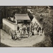 Family gathering in Japanese cemetery (ddr-densho-259-281)