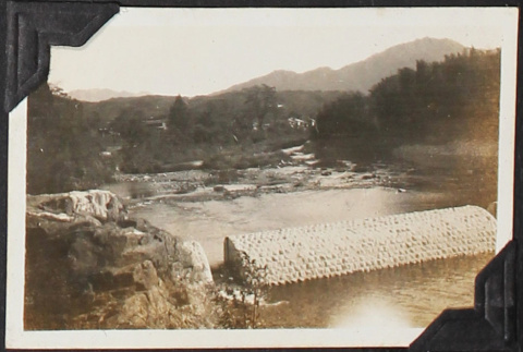 View of river with possible fish weir or dam under construction (ddr-densho-326-324)
