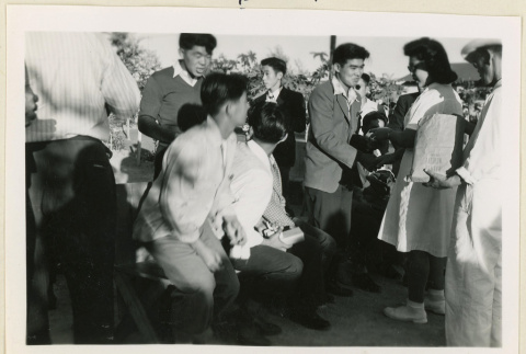 Navy and White girls presenting gifts (ddr-densho-37-1499)