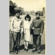 Two soldiers and a woman at the train station (ddr-densho-22-378)