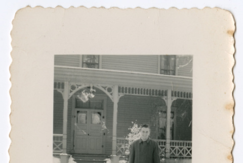 Man outside in snow (ddr-densho-550-16)