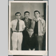 Portrait of seated woman with three men standing (ddr-densho-493-114)