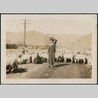 Woman with sheep (ddr-densho-316-106)