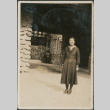 Woman standing outside stone house (ddr-densho-316-170)