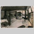 Kaneji Domoto standing inside Usonian house (ddr-densho-329-1146)