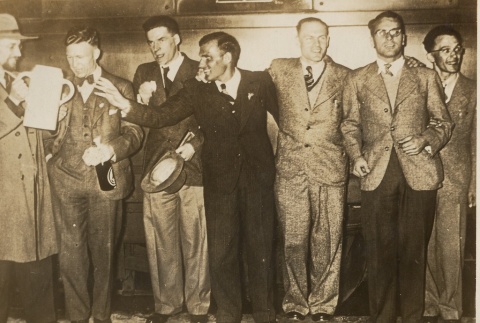 A group of men posing for a photograph (ddr-njpa-1-2570)