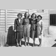 Four women posing for a photograph (ddr-fom-1-74)