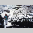 Tom Kubota sweeping snow in the Garden (ddr-densho-354-408)