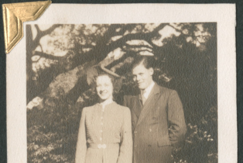 Man and woman standing in garden (ddr-densho-434-365)