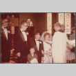 Bride and Groom kneeling with minister (ddr-densho-523-378)