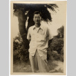 Man sitting on stone bench (ddr-densho-587-99)