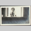 Woman sitting at a table (ddr-densho-355-740)