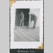 Two men sweeping (ddr-densho-434-203)
