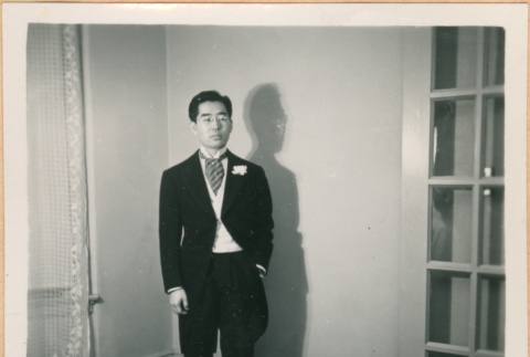 Henri Takahashi with hand in pocket (ddr-densho-410-537)