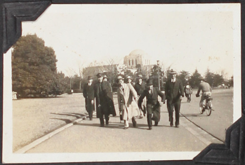 Group of men walking on street (ddr-densho-326-341)