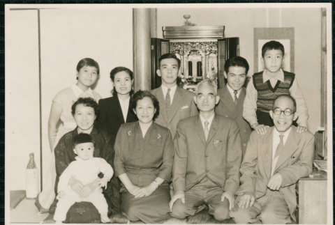 Family poses in front of shrine (ddr-densho-359-1167)