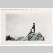 Three People on Rocks overlooking Ocean (ddr-densho-368-720)