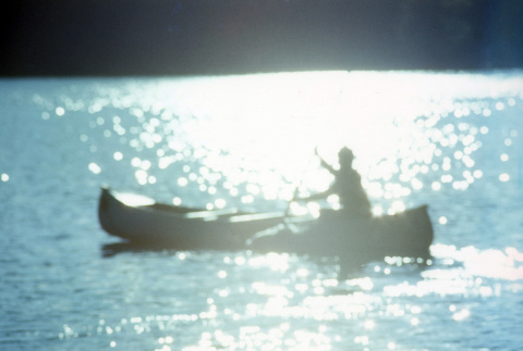 Camper canoeing on the lake (ddr-densho-336-825)