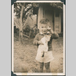 Boy holding a kitten (ddr-densho-483-1116)