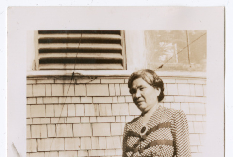 Photo of a woman and child with an animal in a box (ddr-densho-483-732)