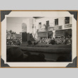 Woman seated on a parade float (ddr-densho-542-43)