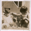 Susan and Glenn Isoshima with a puppy (ddr-densho-477-249)