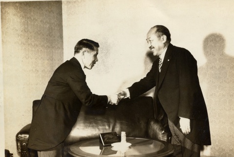 Two men shaking hands (ddr-njpa-1-1743)