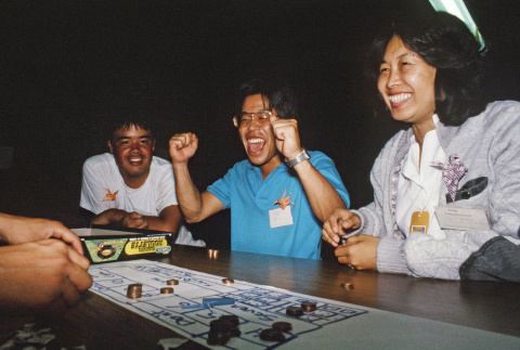Campers playing roulette at casino night (ddr-densho-336-1818)