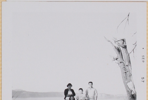 Shiomi Family on overlook by Crater Lake (ddr-densho-522-558)