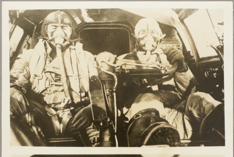 Photos of German pilots in a cockpit, and the view out of a cockpit (ddr-njpa-13-863)